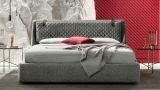 Letto con testata imbottita: modello, materiali e stile